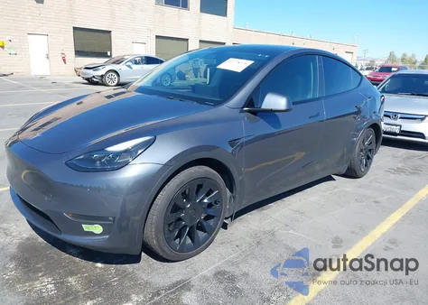 2023 Tesla Model Y Awd/Long Range Dual Motor All-Wheel Drive из США, поврежденный, VIN 7SAYGAEE3PF756915